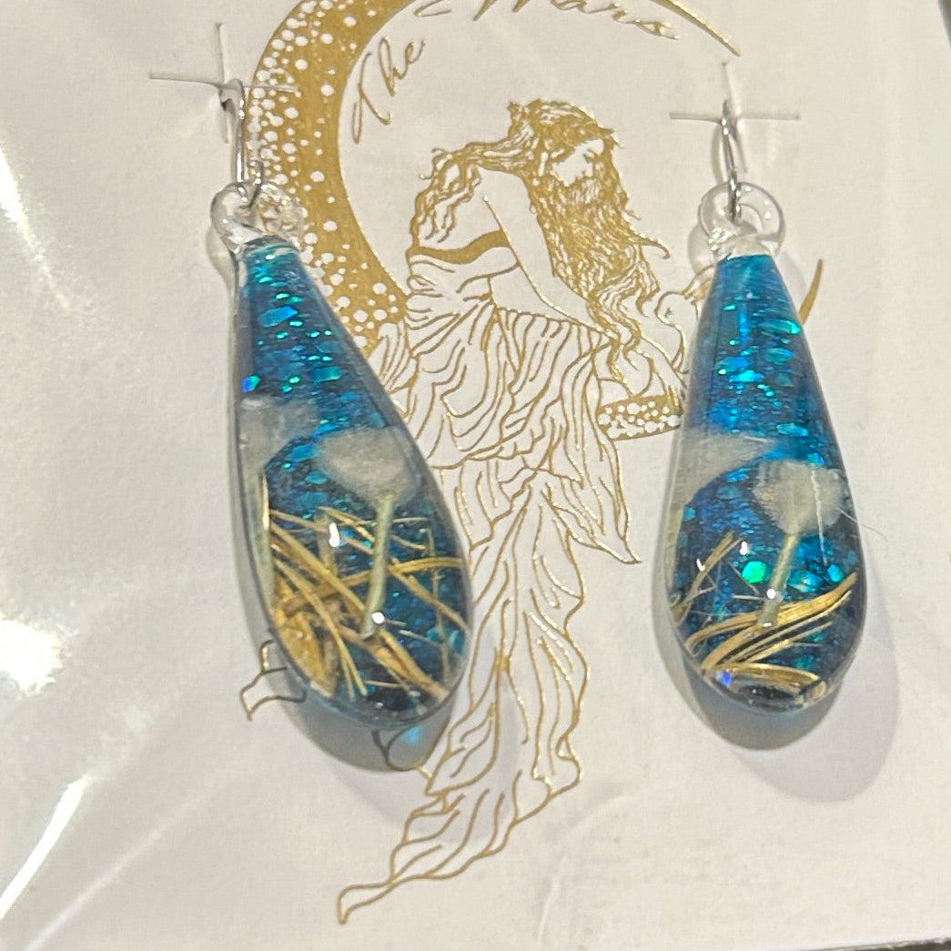 Handmade botanical dichroic glass drop earrings blue teardrop real dried white flowers golden grass sterling silver ear wires artisan handcrafted Thailand