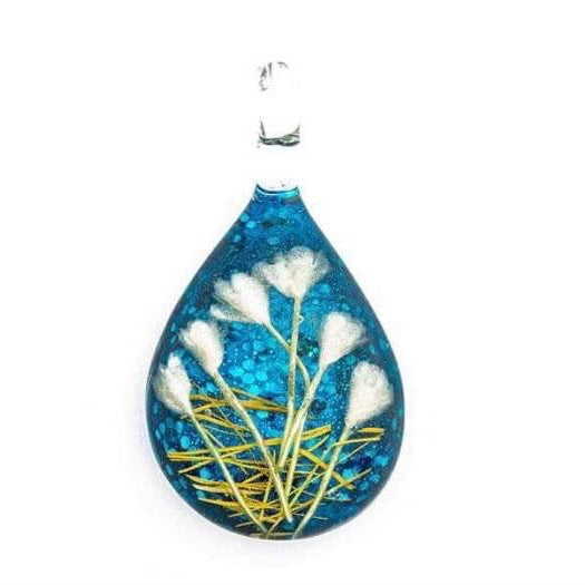 Handmade botanical dichroic glass teardrop pendant 2 inches with real dried grass straws suspended inside blue glass on 21 inch cloth chain