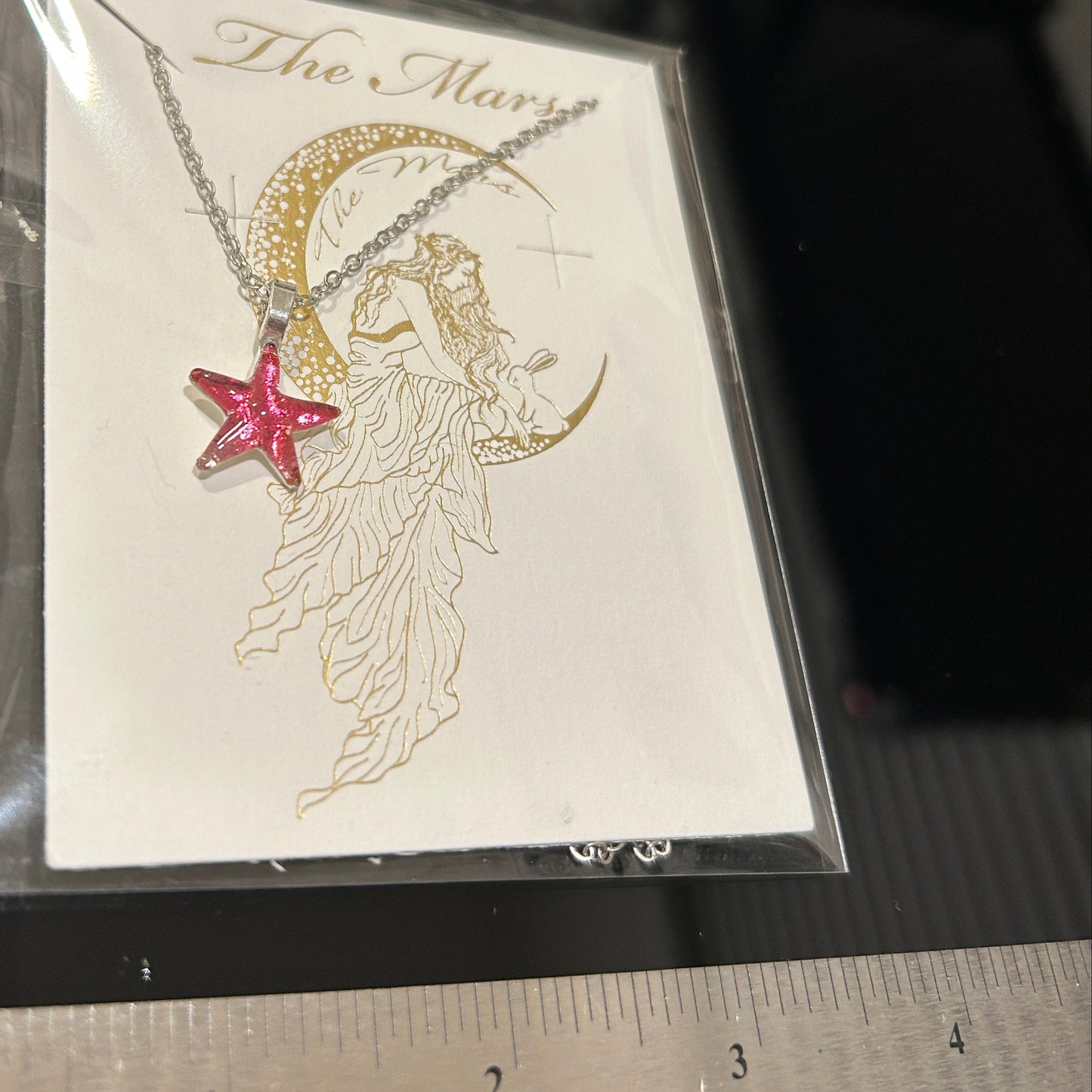 Handmade dichroic glass starfish pendant 1 inch with color-shifting pink effects on 21 inch sterling silver chain