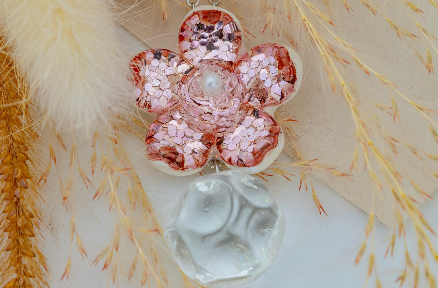 Pair of handmade pink dichroic glass flower stud earrings with pearl centers and dangling crystal balls sterling silver posts butterfly backs artisan jewelry