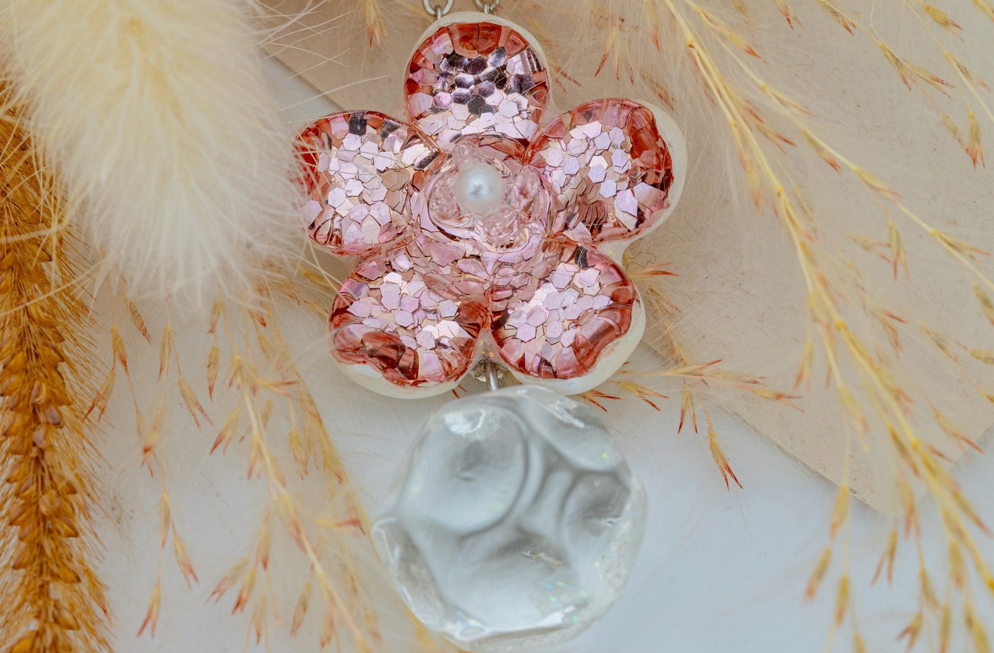 Pair of handmade pink dichroic glass flower stud earrings with pearl centers and dangling crystal balls sterling silver posts butterfly backs artisan jewelry