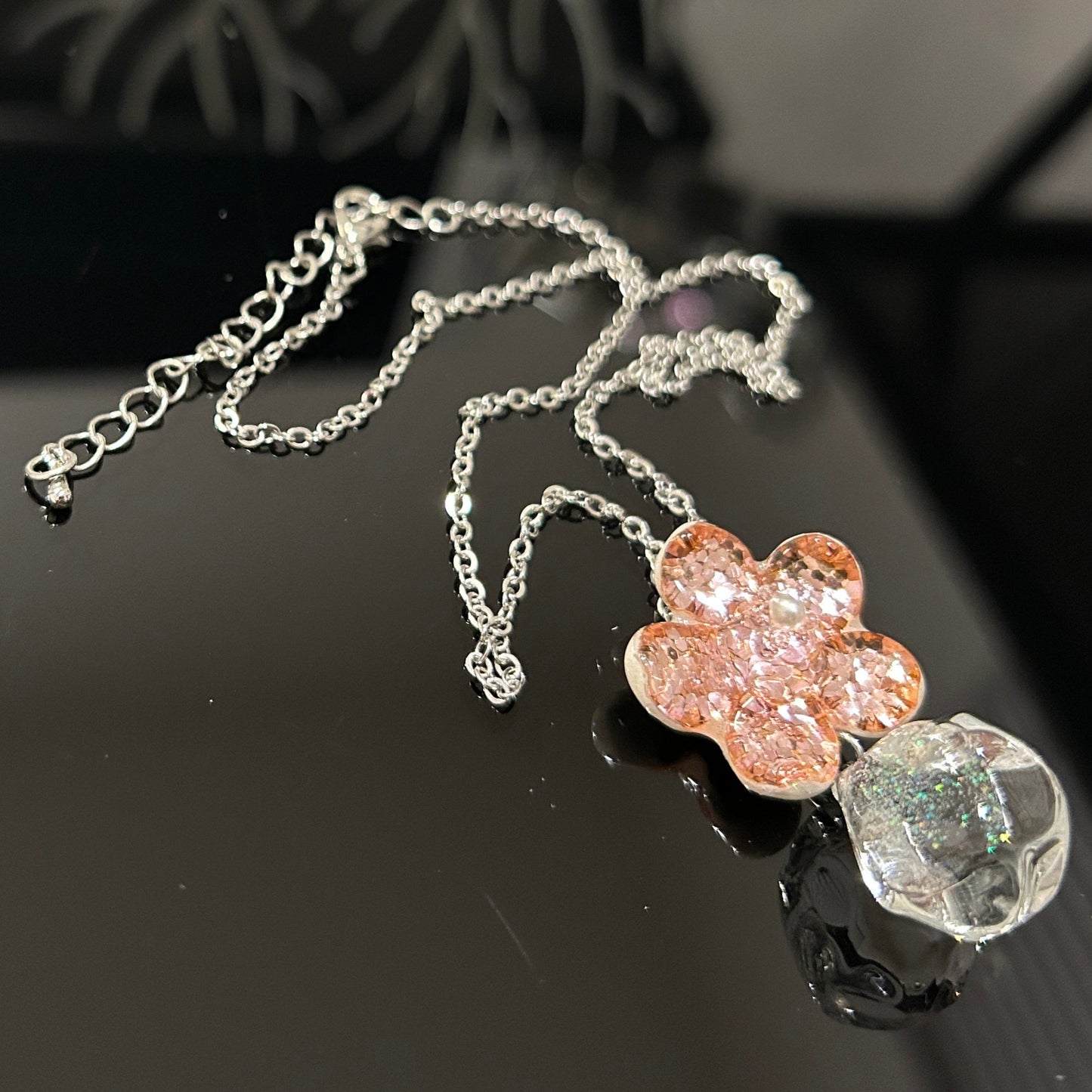 Handmade pink flower dichroic glass pendant with crystal ball drop. 1 inch flower, 1.5 inch total. Pearl center. 21" sterling silver chain included. Ships from Oregon.